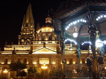 Featured is a photo of the Plaza de Armas in Guadalajara, Mexico.